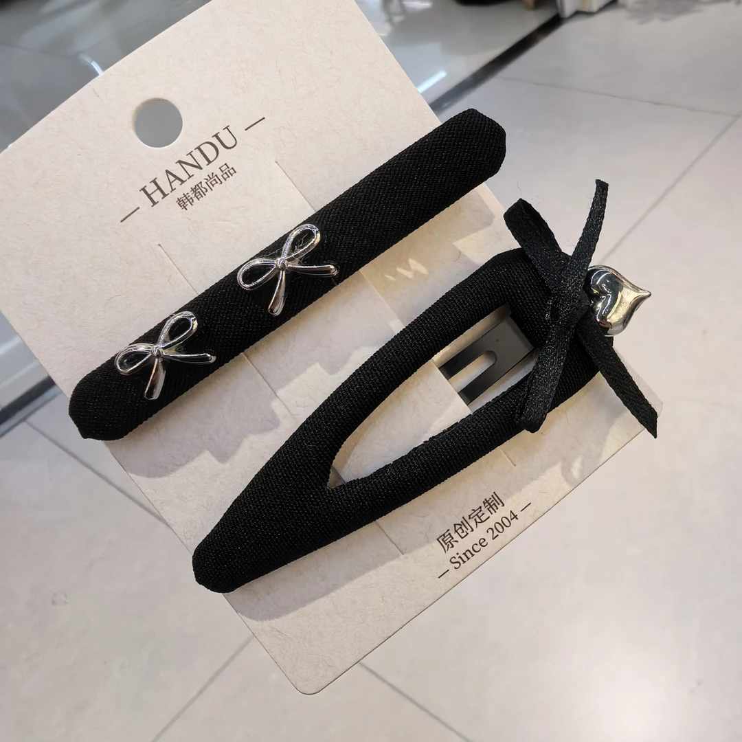 B409黑色蝴蝶结爱心边夹掰掰夹一对