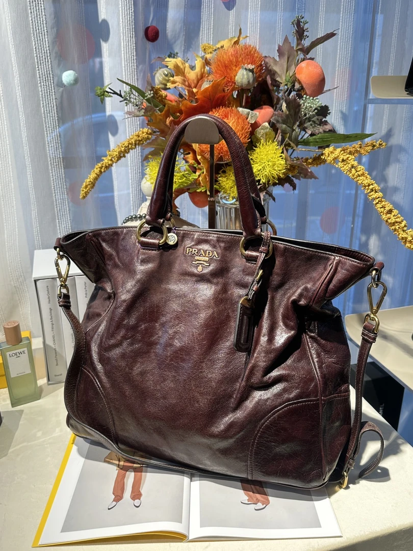95新 Prada/普拉达 怪怪 复古咖色托特包