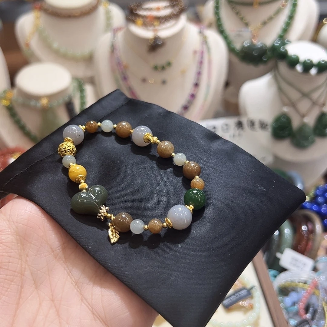 未镶嵌手链和田玉（糖玉）草**绯