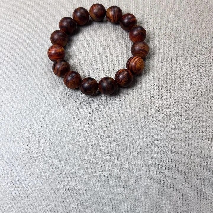 木质孤**鸦海黄手串一条