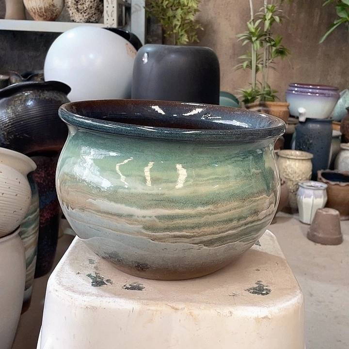 紫砂花盆正品口25高18。z z