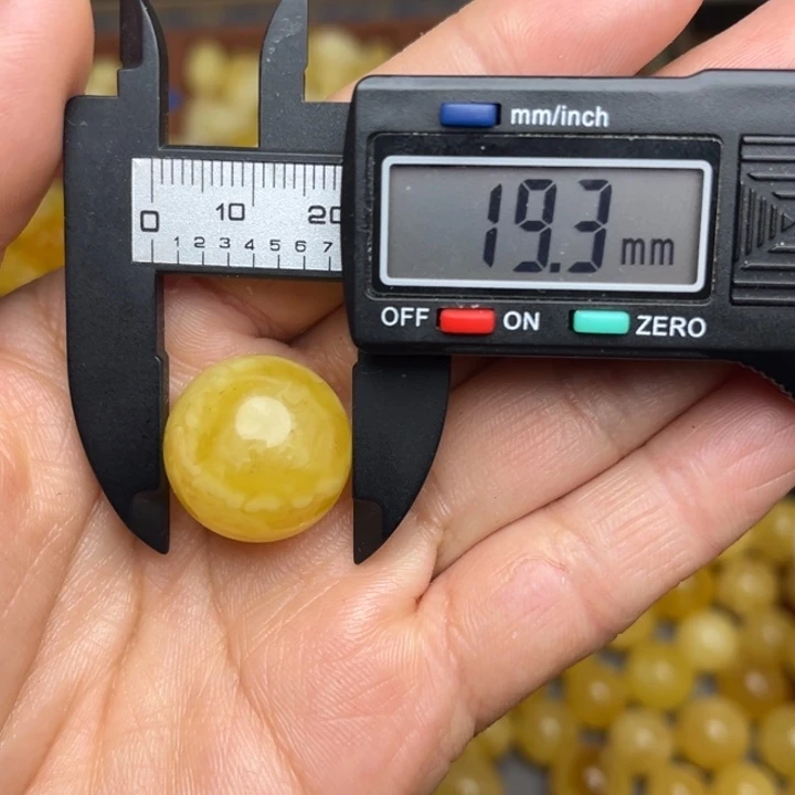 蜜蜡未镶嵌珠宝奇石鸡油黄妖花散珠一粒微瑕