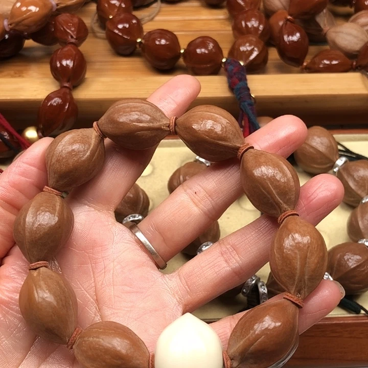 嗯***呢橄榄核手串梅林铁核18 X26