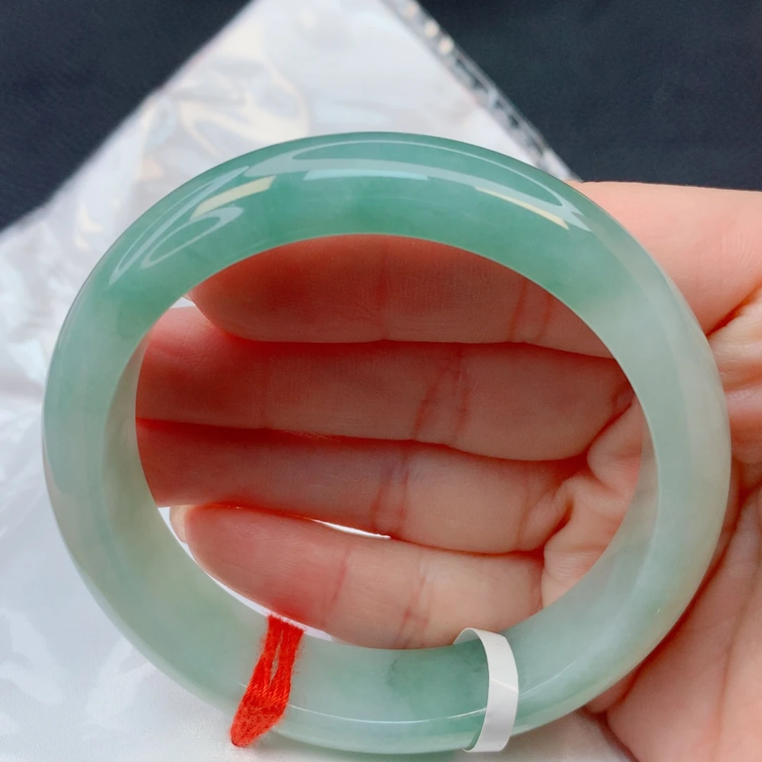 华***姐翡翠未镶嵌手镯54-55胶润半山水湖水绿