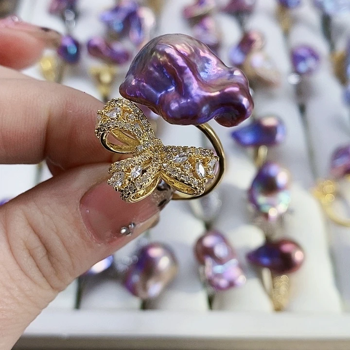 银S925镶嵌耳饰淡水珍珠乔***卡