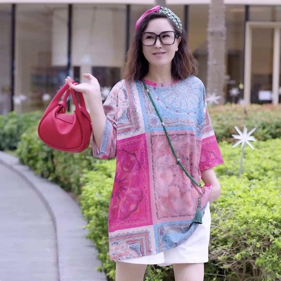 波西米亚暗纹提花2025年新款时尚气质圆领薄款显瘦印花百搭针织