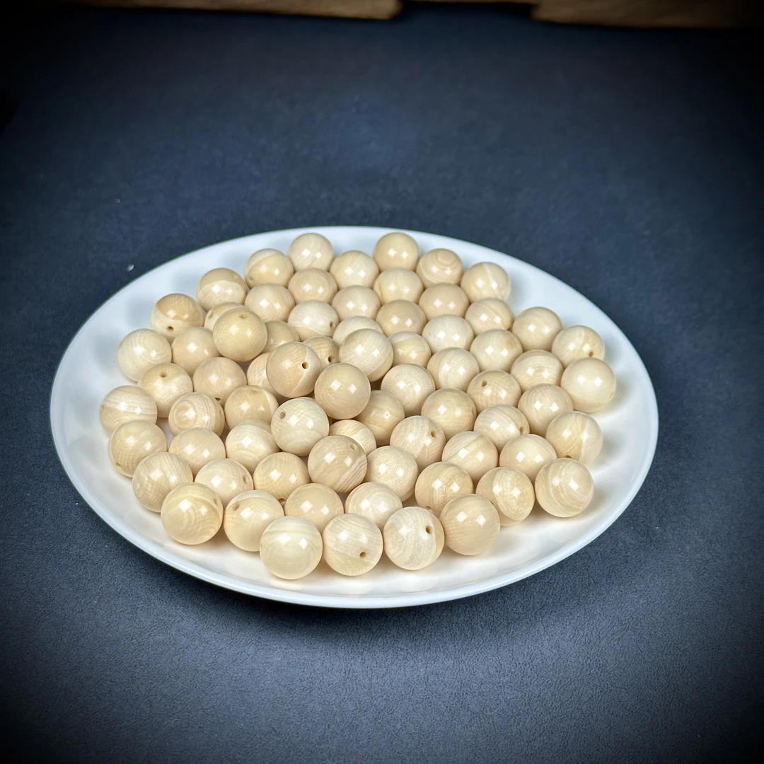 A211天然猛犸牙 芝士皮圆珠约14mm 随机一个发货