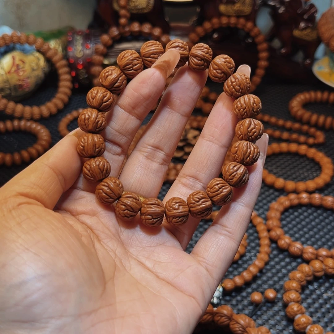 用***9手串桃核13顶级双脊龙单圈