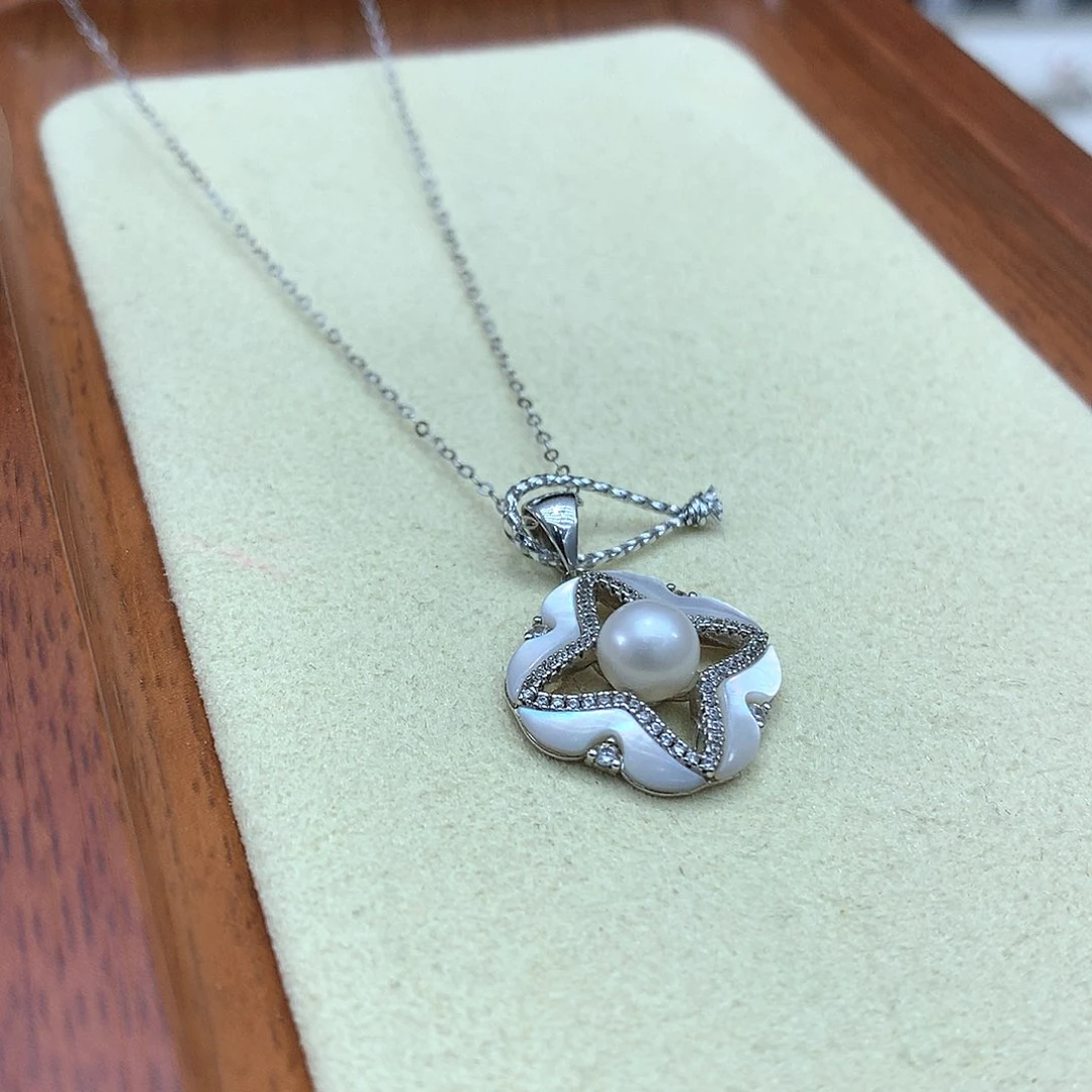 淡水珍珠吊坠(赠链)银S925镶嵌每****?