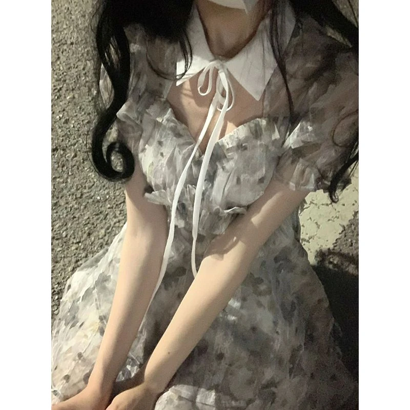 677夏新款法式高级感纯欲风泡泡袖碎花连衣裙女收腰蓬蓬公主裙子