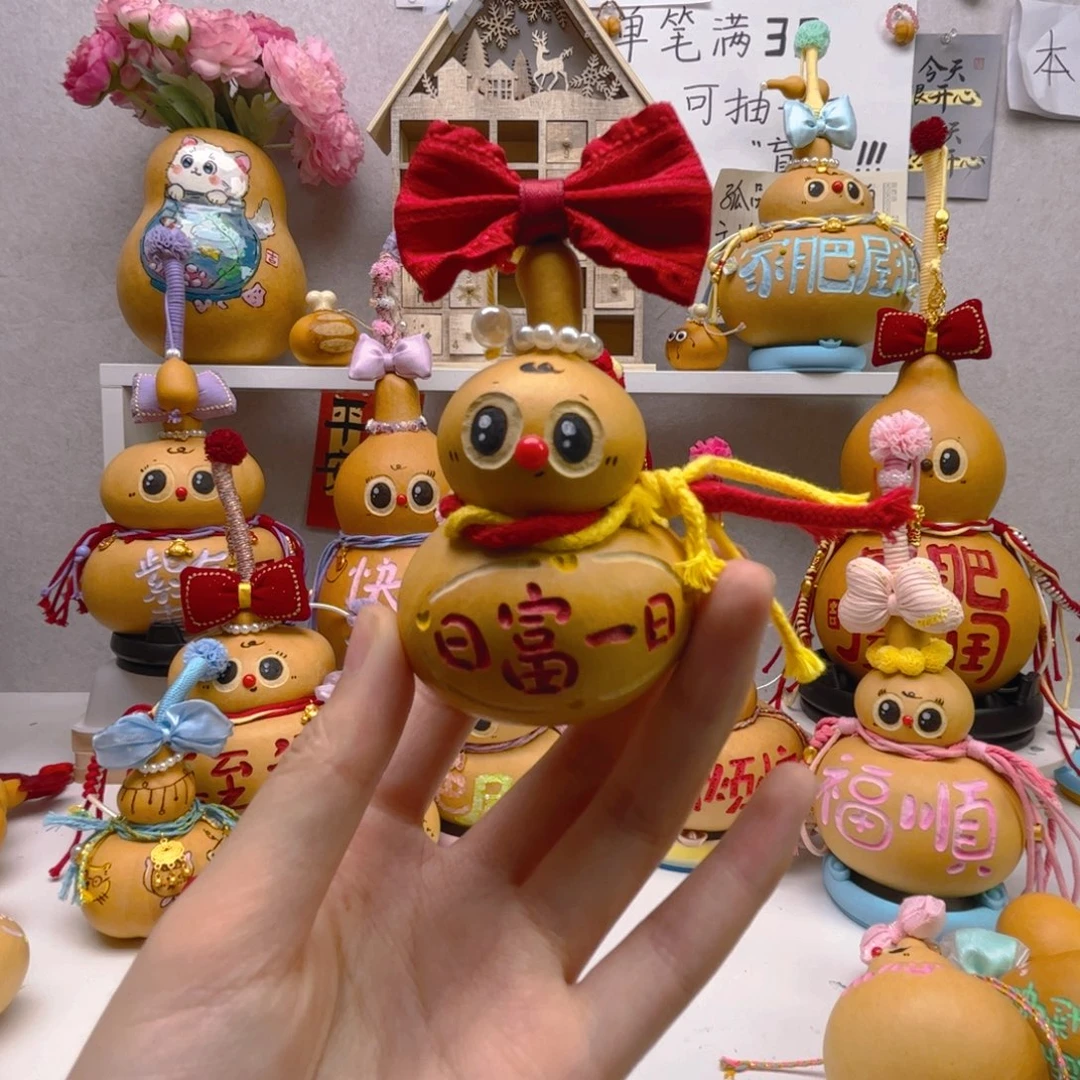 小***手日复一日钱袋子葫芦摆件