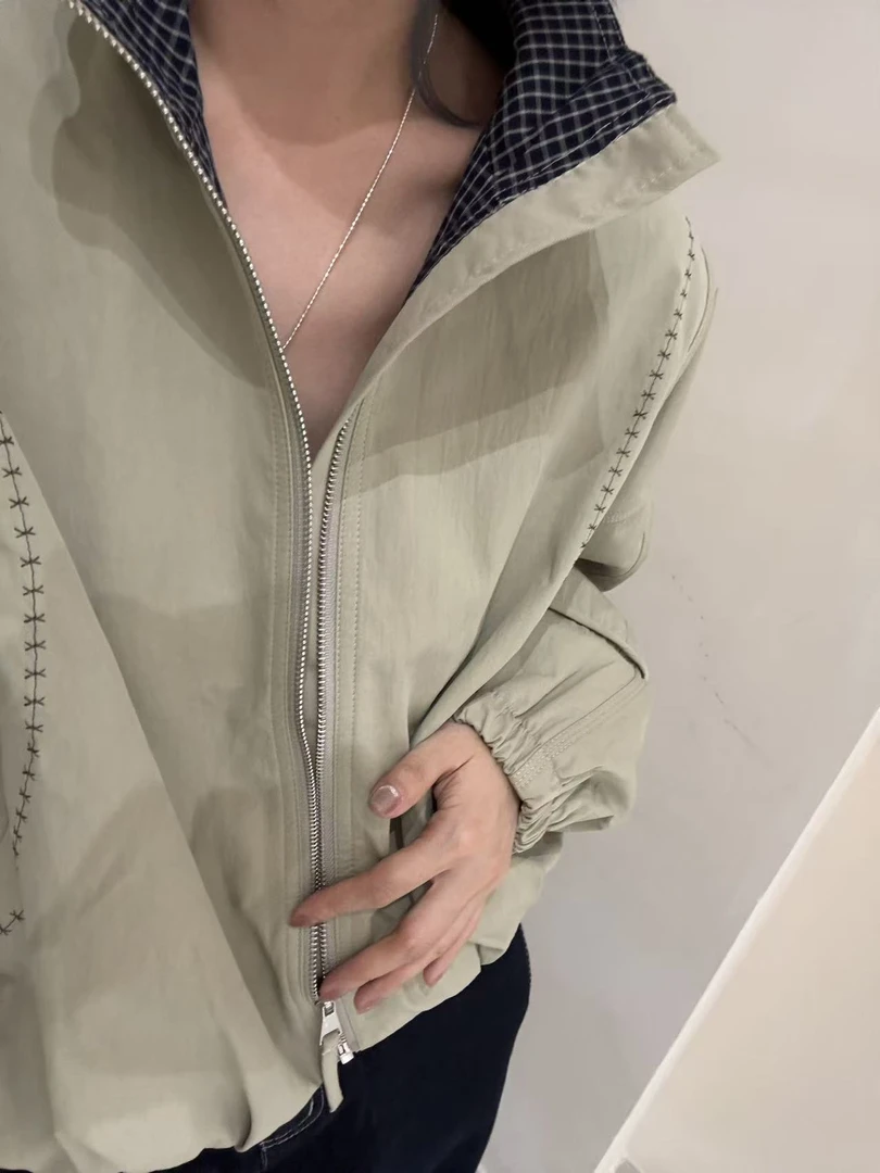 CJ设计感格子拼接外套