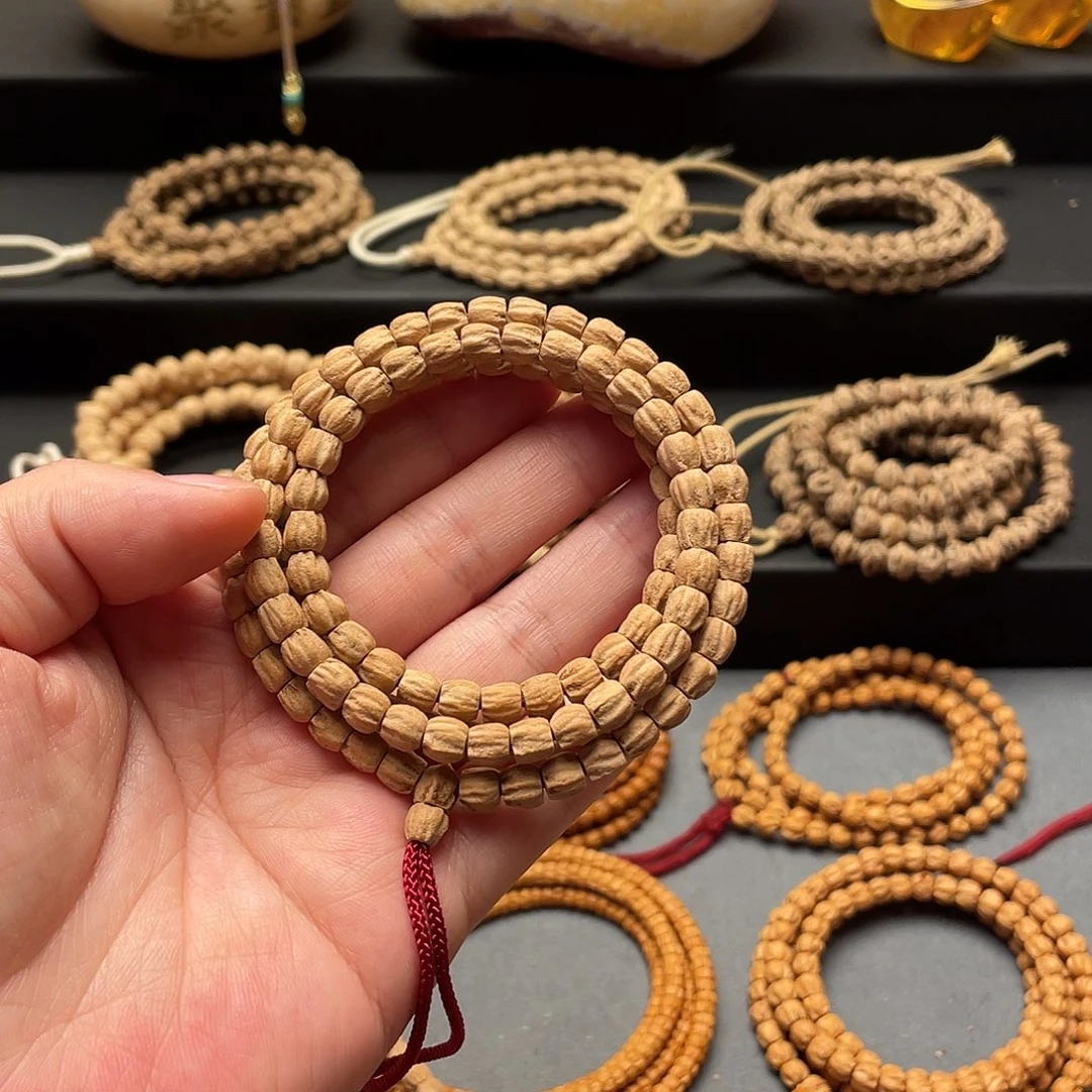 闲***编柏香籽/百香籽吊坠