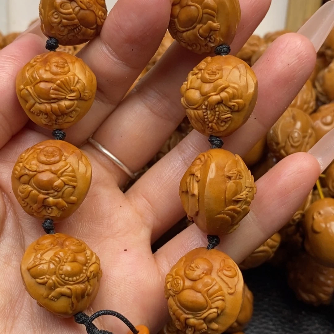 小****橄榄核手串浮雕米勒