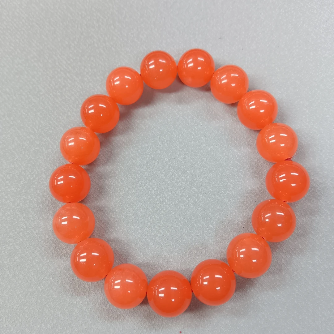 1021号-卡12mm橘色圆珠手串