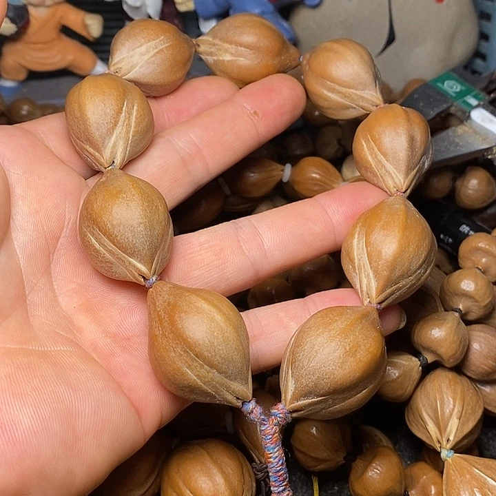 橄榄核手串三面佛手持13
