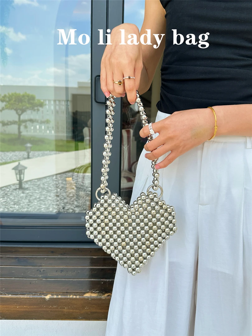 2025韩风新款银色爱心包手提单肩包高级感金属感小包手工串珠包女