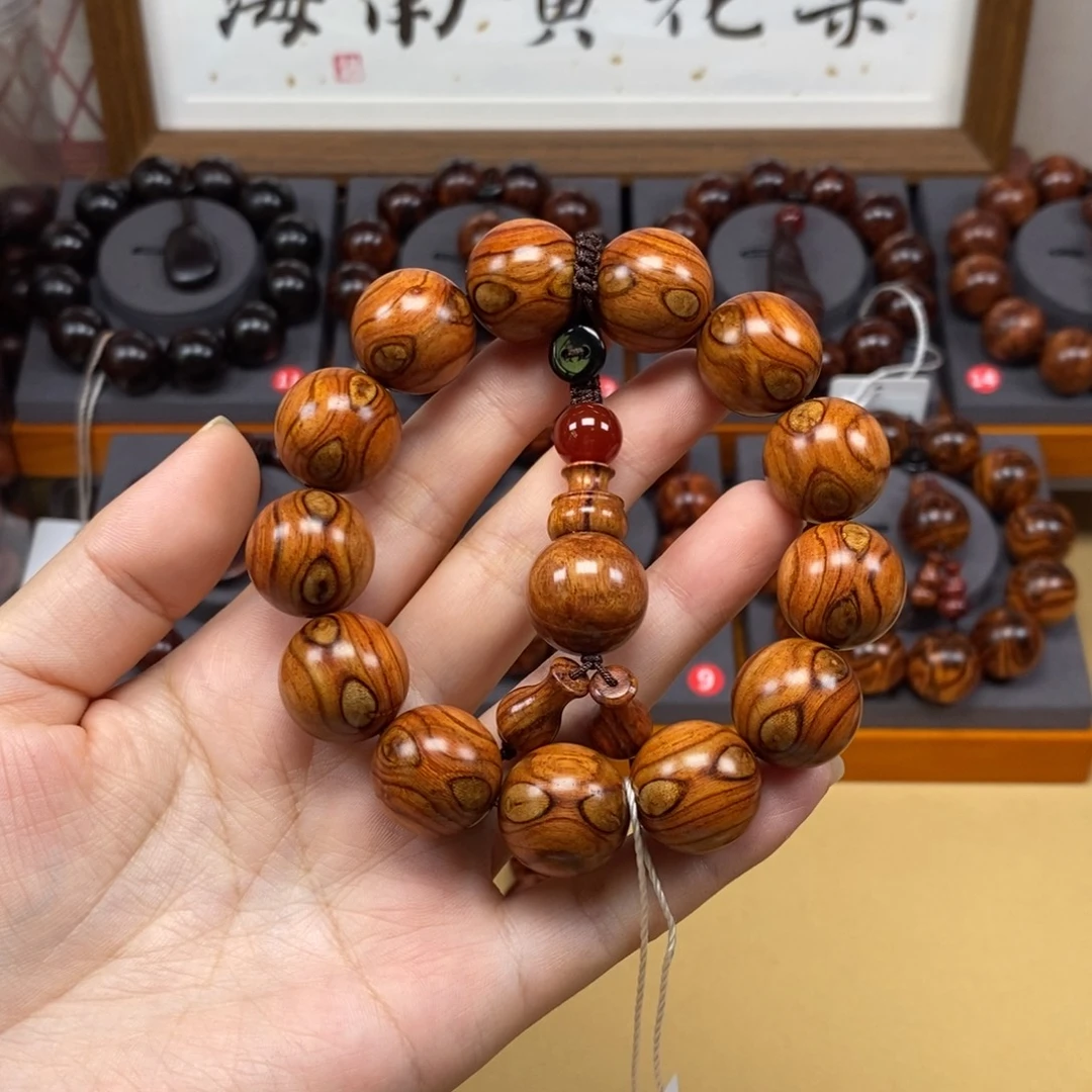 小***娄黄花梨手串海南黄花梨奥特曼黄金瞳对眼鬼脸纹