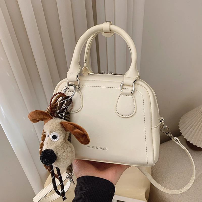 高级感小众包包女春夏季百搭2025新款时尚斜挎包复古手提保龄球包