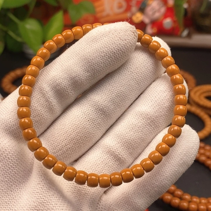 长***理手串橄榄核5.2老挝核尖直切单圈微微白