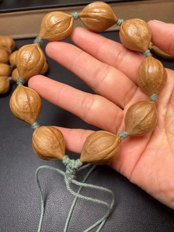 橄榄核雕1.9铁核三面佛