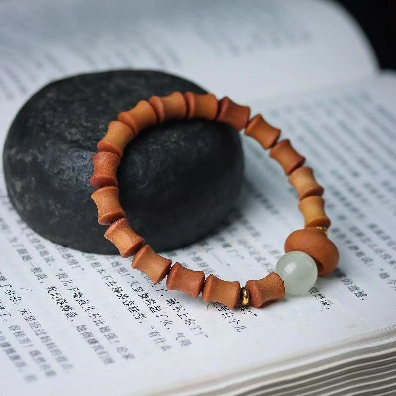 S0066-檀香木竹节0.7*1.0夜光跑环