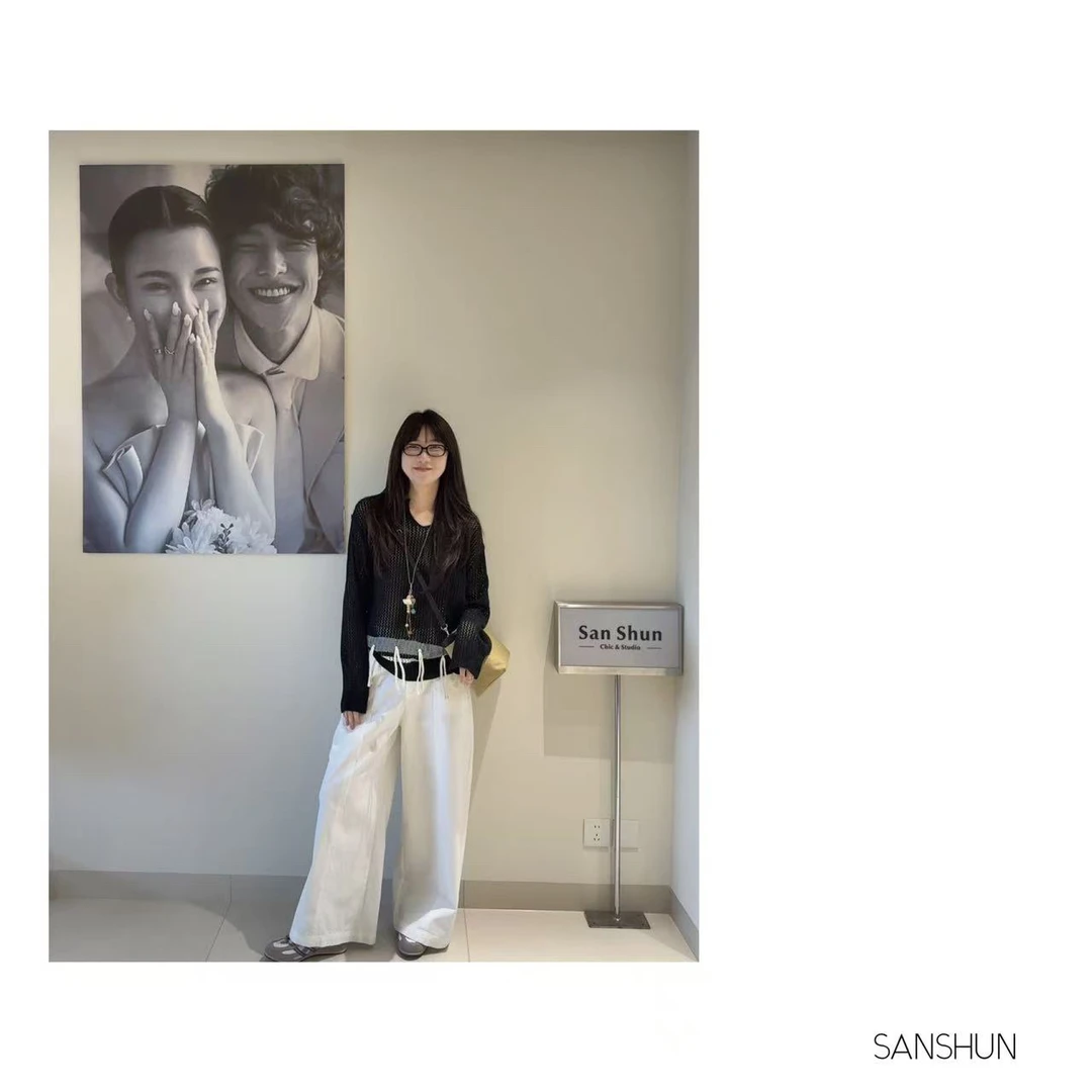 Sanshun-（浮结）-秋季新款气质独特镂空显瘦针织长袖外穿时尚