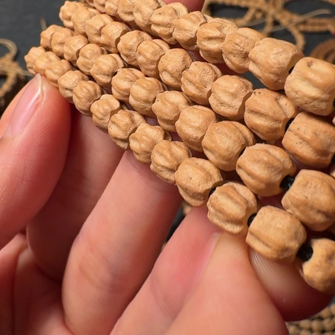 黔***夜柏香籽/百香籽吊坠