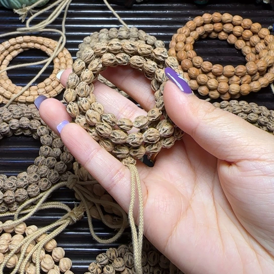 沐***戏柏香籽/百香籽吊坠