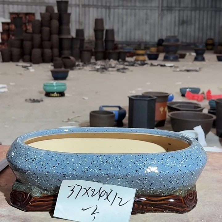 紫砂花盆手中制作100