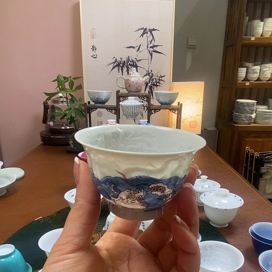 手****6优惠脱胎瓷高温手工超薄胎内模印青花海水主人杯