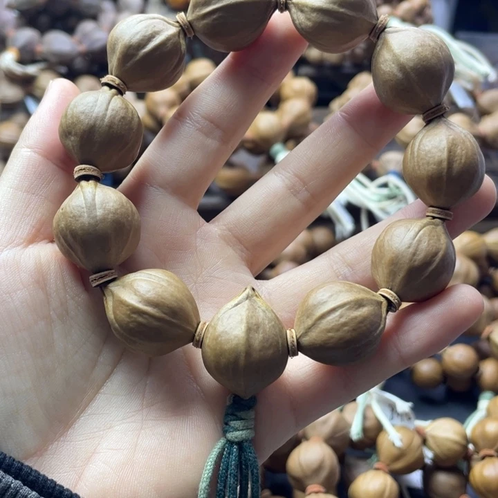 づ****橄榄核手串/手链广东铁20*25
