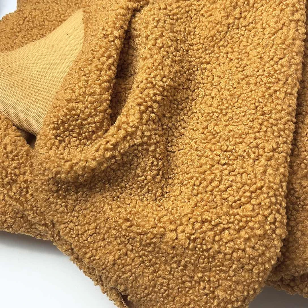 混纺姜黄羊羔毛1.5米。