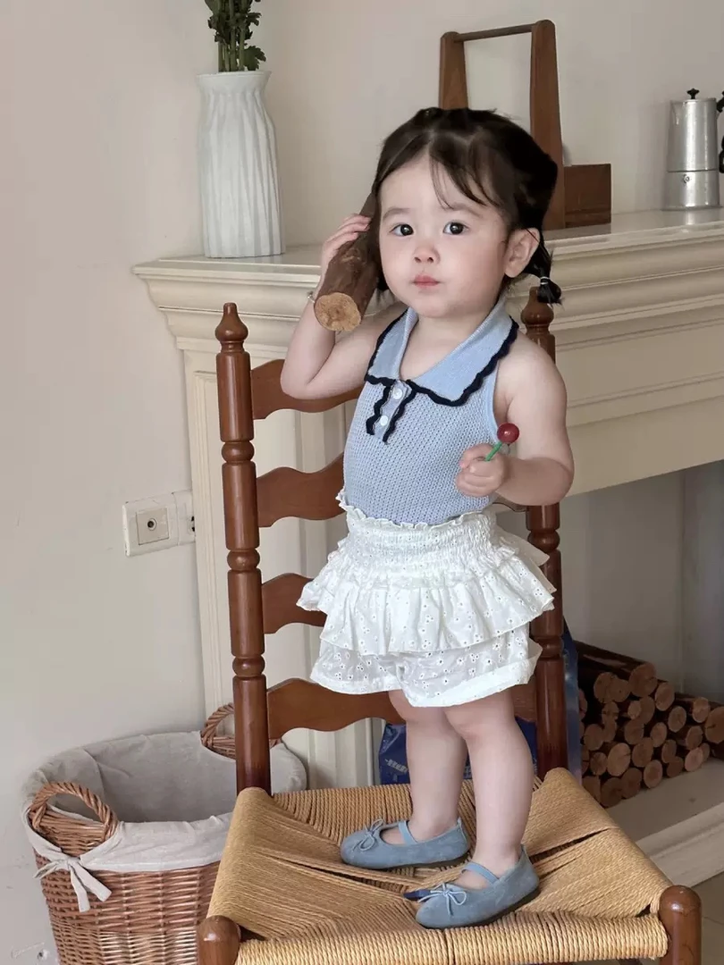 挂脖露背翻领针织上衣