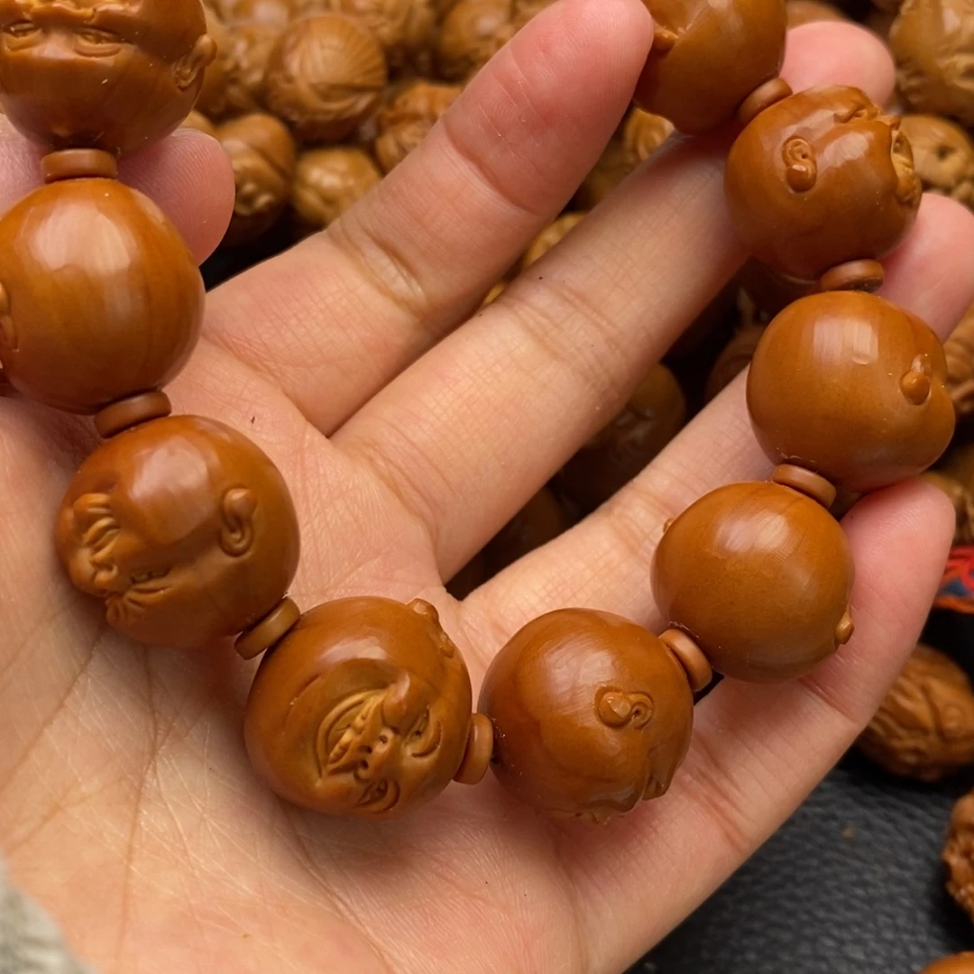 瑞***芳橄榄核手串人生百态1.9