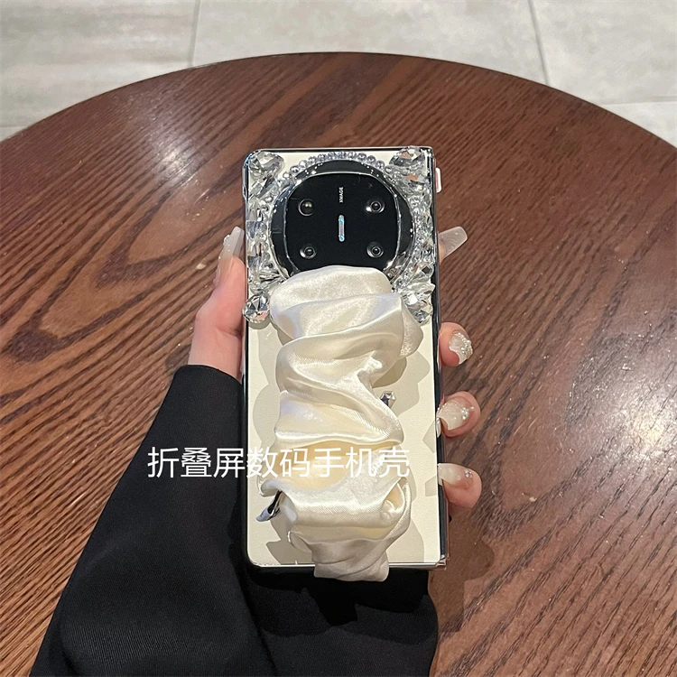 适用华为mate x6/x5手机壳素皮水钻丝巾腕带全包防摔防窥壳膜一体