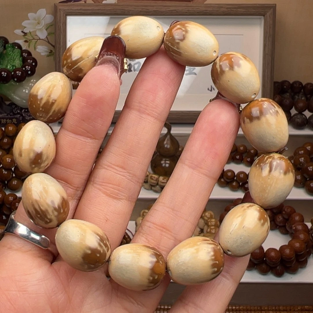 紫金鼠手串半实心花皮枣珠