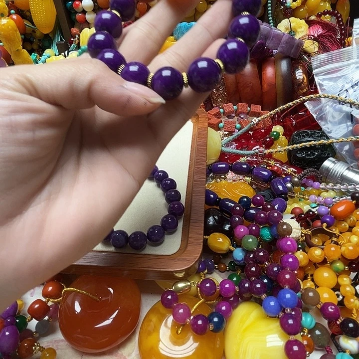 树脂制品找****由1256紫色手链