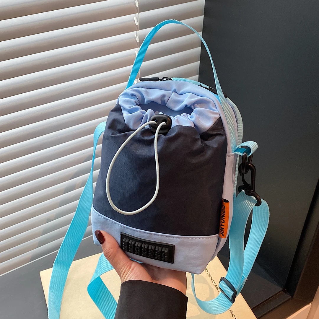 户外登山牛津布便携水杯包包女2025新休闲运功斜挎水壶包手机包TJ