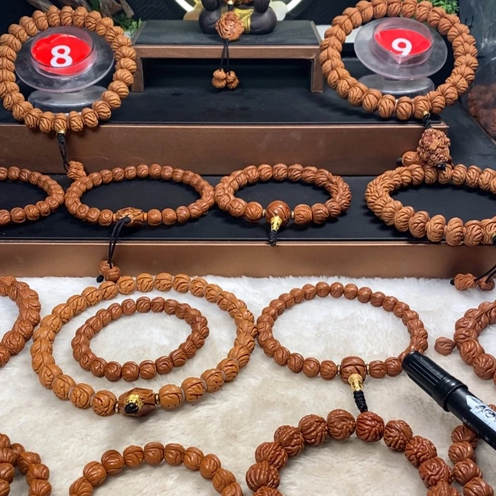 桃核吊坠壯秦岭龙纹