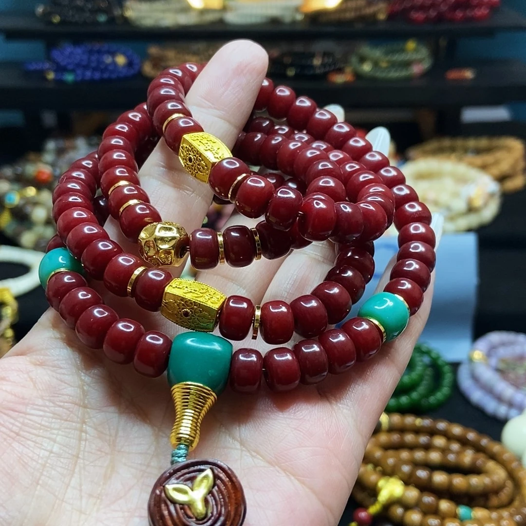 橘***唇佛心果吊坠菩提果