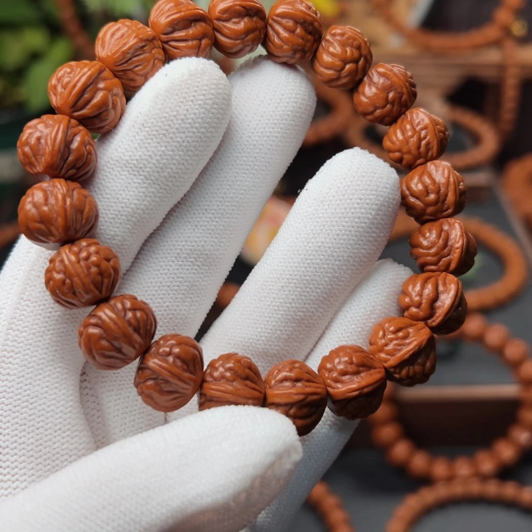 吊坠桃核不***李1.3顶货双脊龙手串