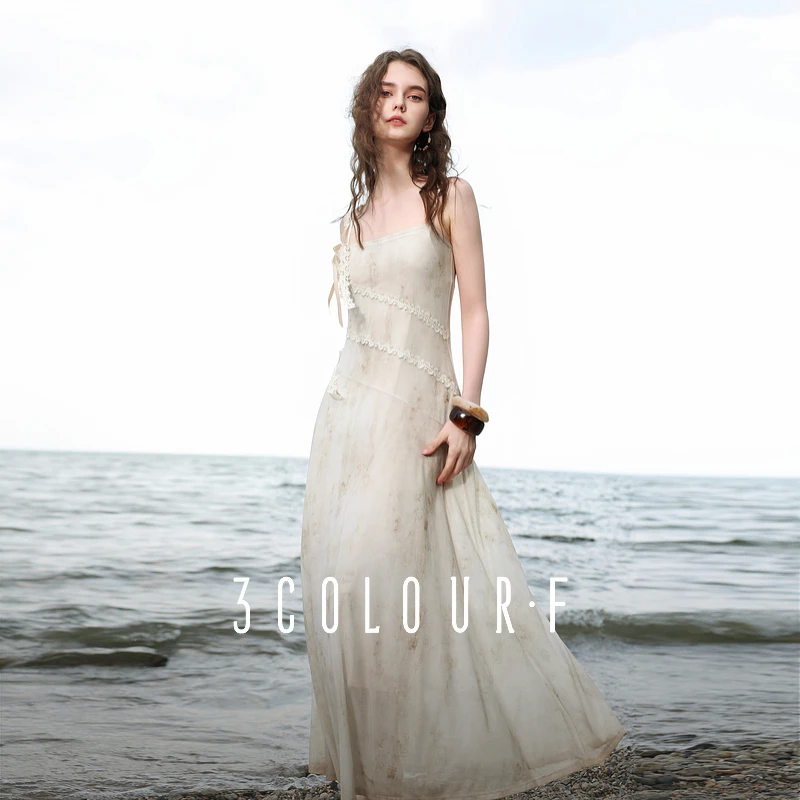 三彩独醒2025夏季新款法式度假风连衣裙花边吊带网纱长裙F