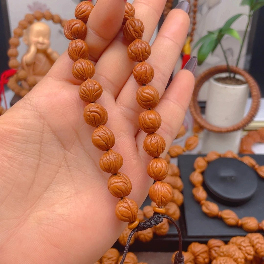 桃核吊坠野生玉龙脊1.1尺。