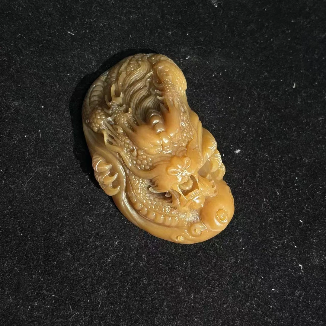 lot30和田玉且末糖龙纹手把件/保利