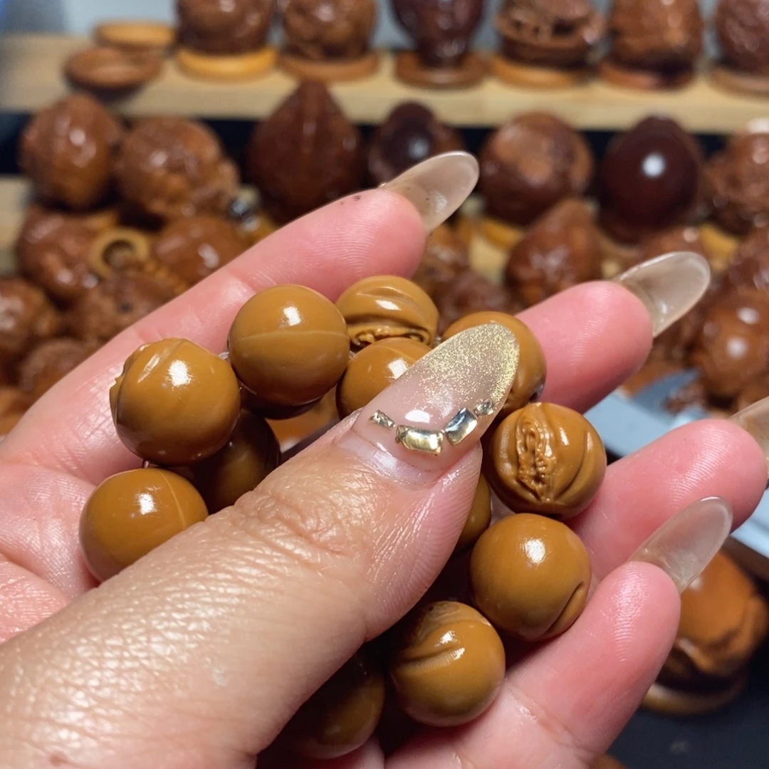 【闪购商品】橄榄核吊坠M***木猴头串