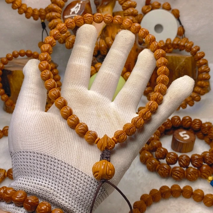 桃核吊坠S****n精品玉龙脊大手持