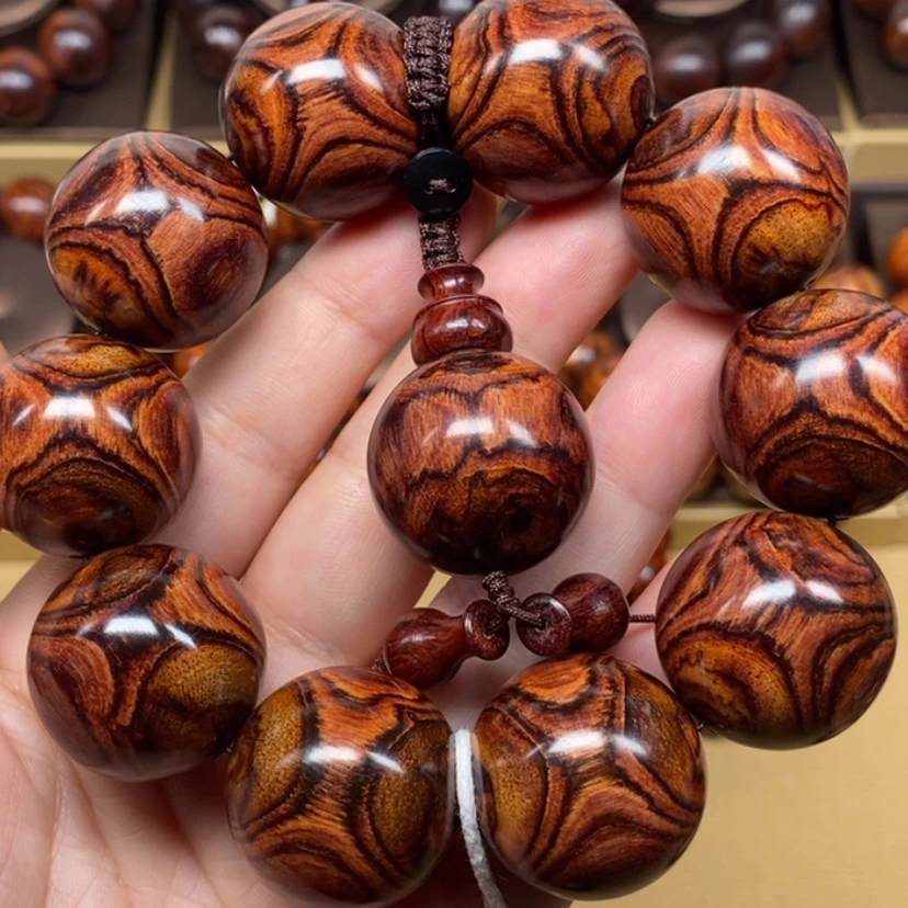 【闪购商品】黄花梨/降香黄檀手串/手链语**情海黄2.5对眼鬼脸