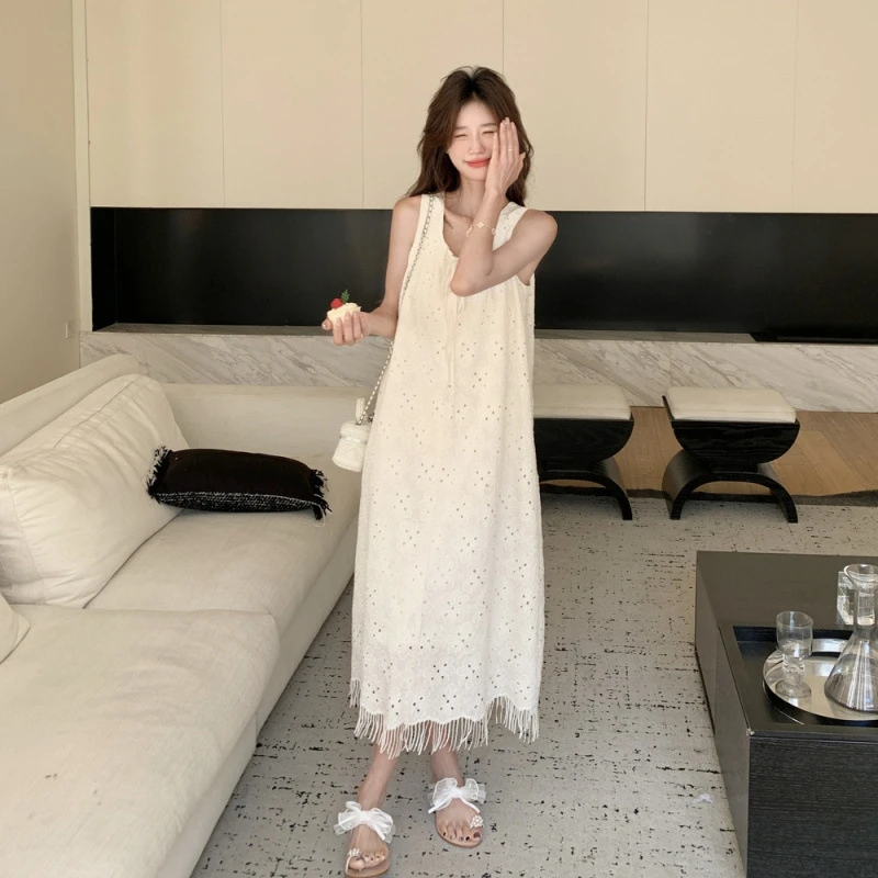 737夏季新款镂空系带吊带连衣裙温柔杏色背心长裙海边度假风长裙
