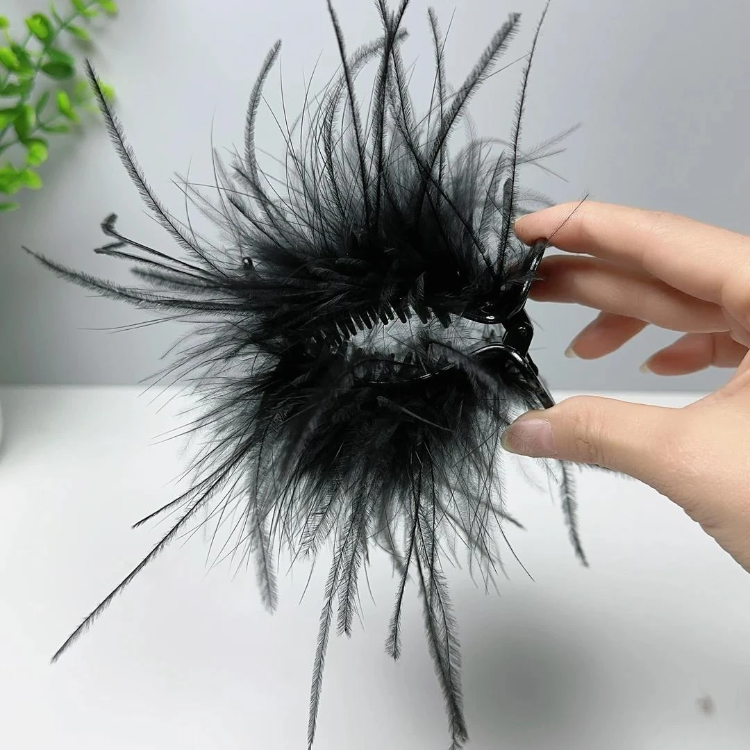 春夏新款羽毛丸子头抓夹高马尾毛毛发夹百搭后脑勺盘发女夹子发饰